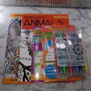Puzzle books, adult coloring books and markers